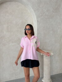 Blusa Rosada con Flor